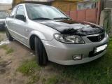 ������������� Mazda 323